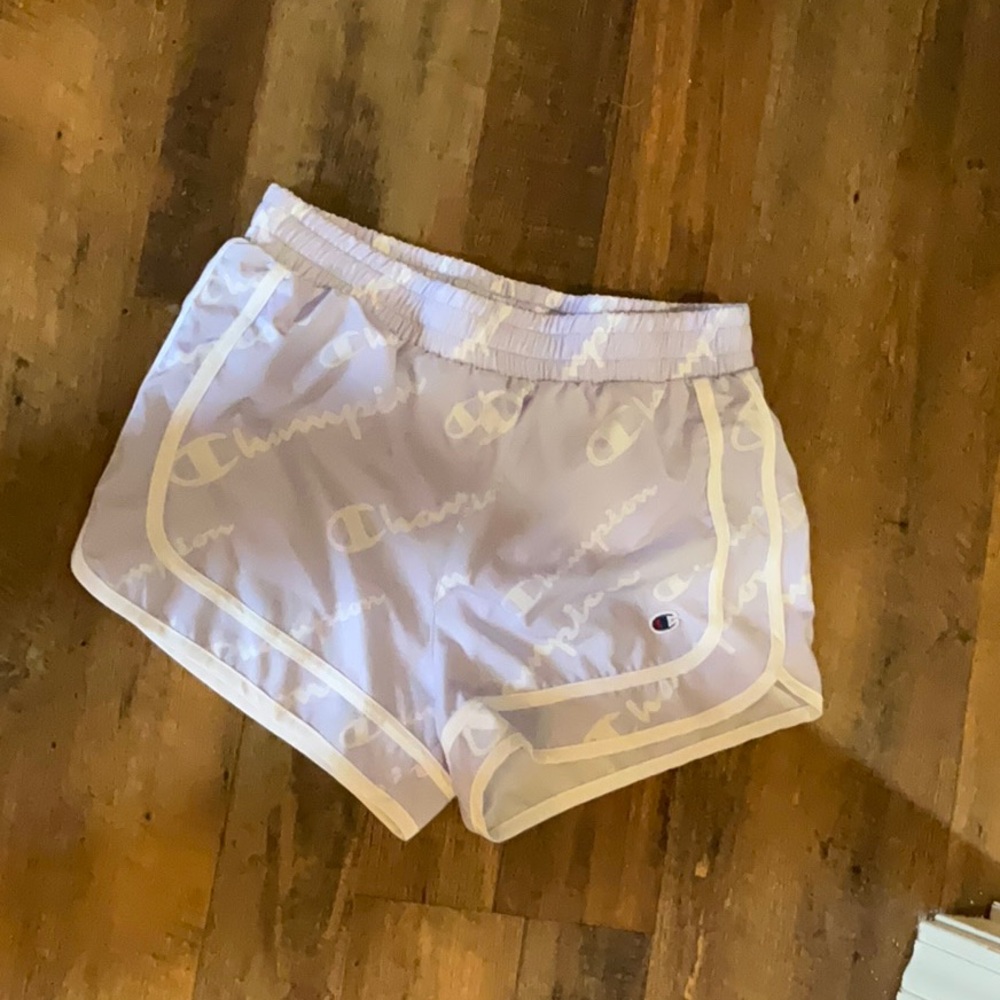 Light purple Champion shorts.